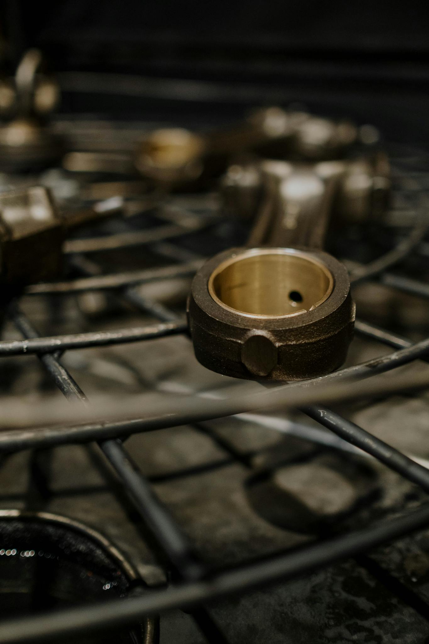 Detailed shot of metal components in an industrial setting, showing craftsmanship.